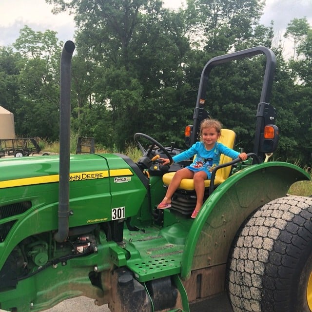 Arabella Kushner looked right at home on the big John Deere tractor — or maybe she was getting involved in the family business.
Source: Instagram user ivankatrump