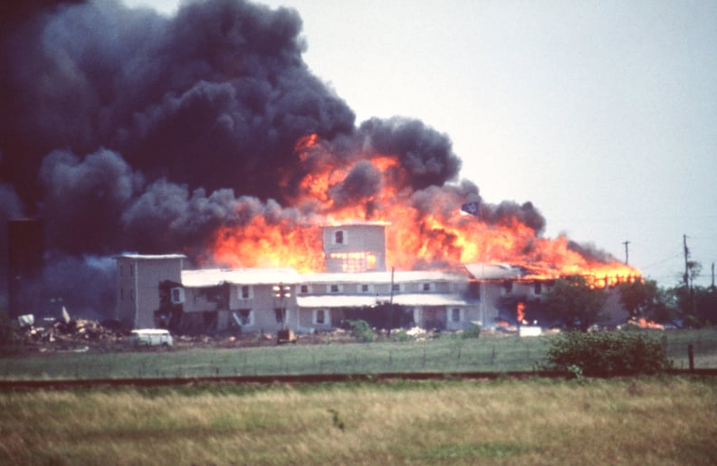 Smoking fire consumes the Branch Davidian Compound during the FBI assault to end the 51-day standoff with cult leader David Koresh and his followers. --- Photo by Greg Smith/Corbis SABA (Photo by Greg Smith/Corbis via Getty Images)