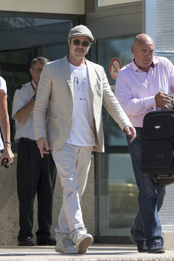 Brad Pitt Wears Homemade Shirt at Airport in France | Photos