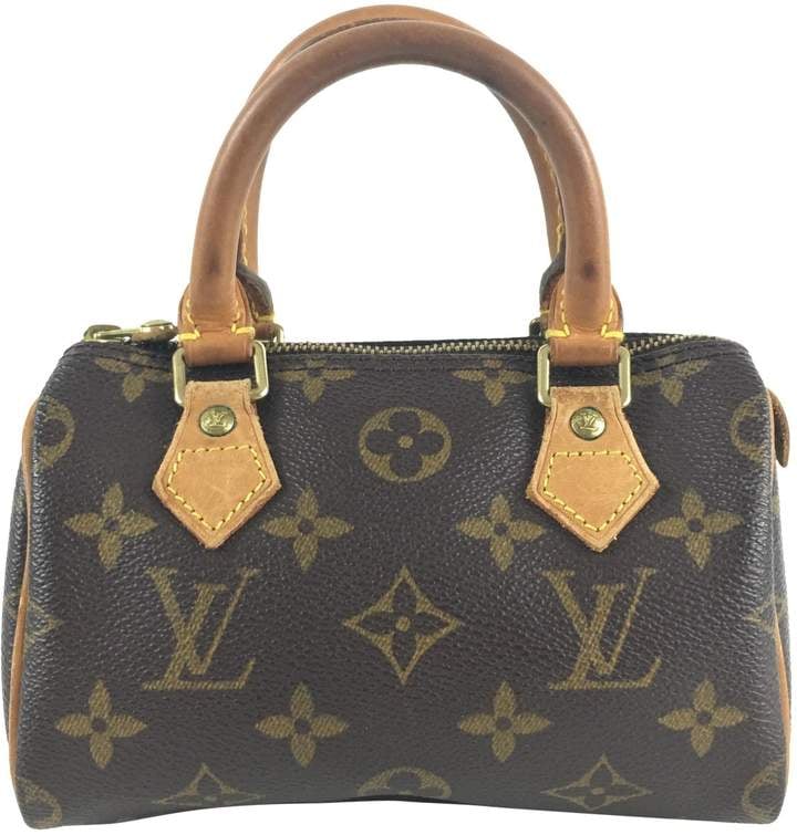 Louis Vuitton Speedy Cloth Handbag, Kourtney Kardashian Is Carrying a Mini  Designer Bag That Baby Stormi Just Might Inherit