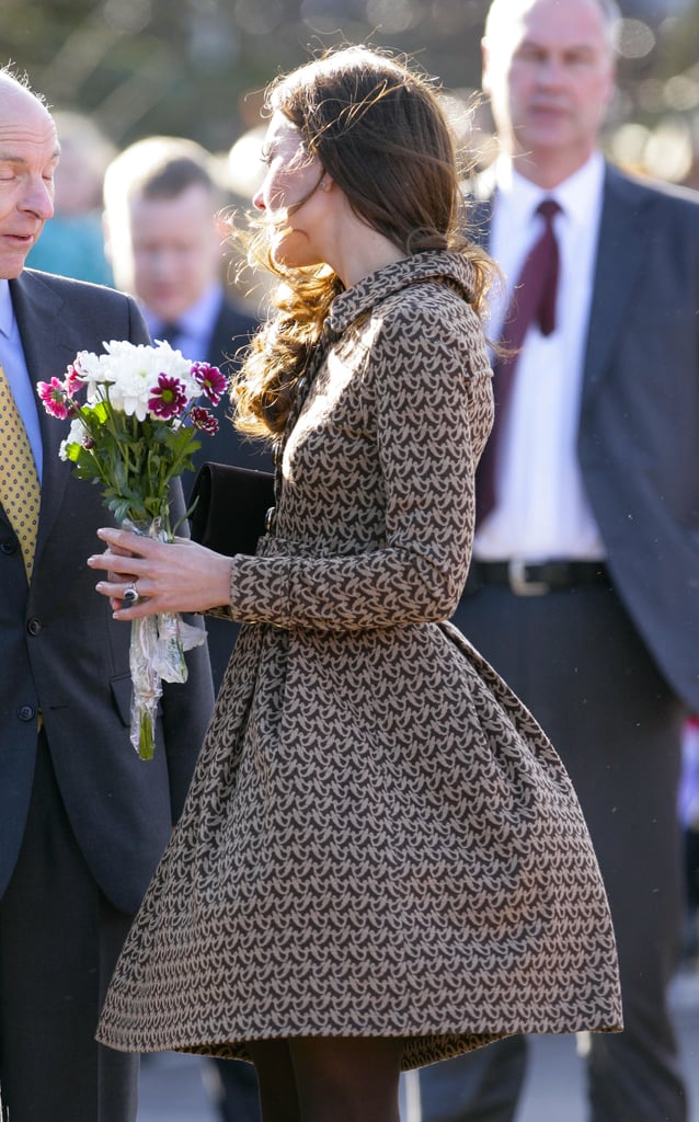 In February 2012, Kate's Orla Kiely dress was blown up by a gust as she visited the Rose Hill Primary School in England.