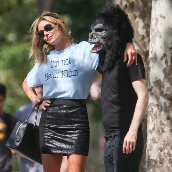 Heidi Klum Posing With a Man in a Gorilla Mask