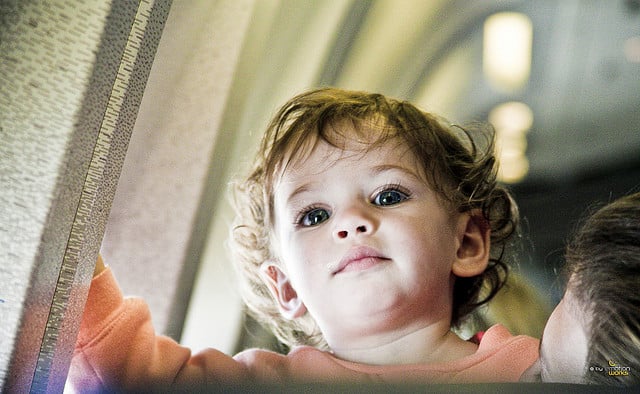 On an Airplane, Tell Her You Have Kids Too
