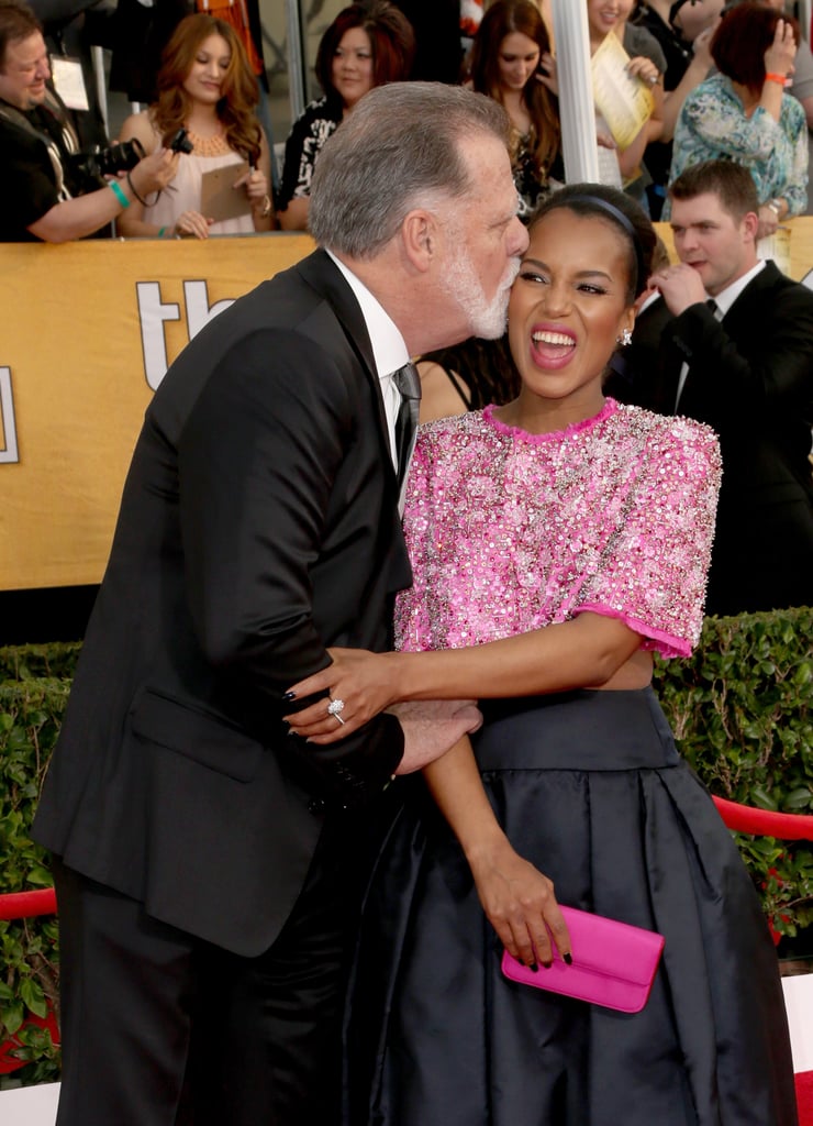 Kerry Washington couldn't resist a kiss from Taylor Hackford.