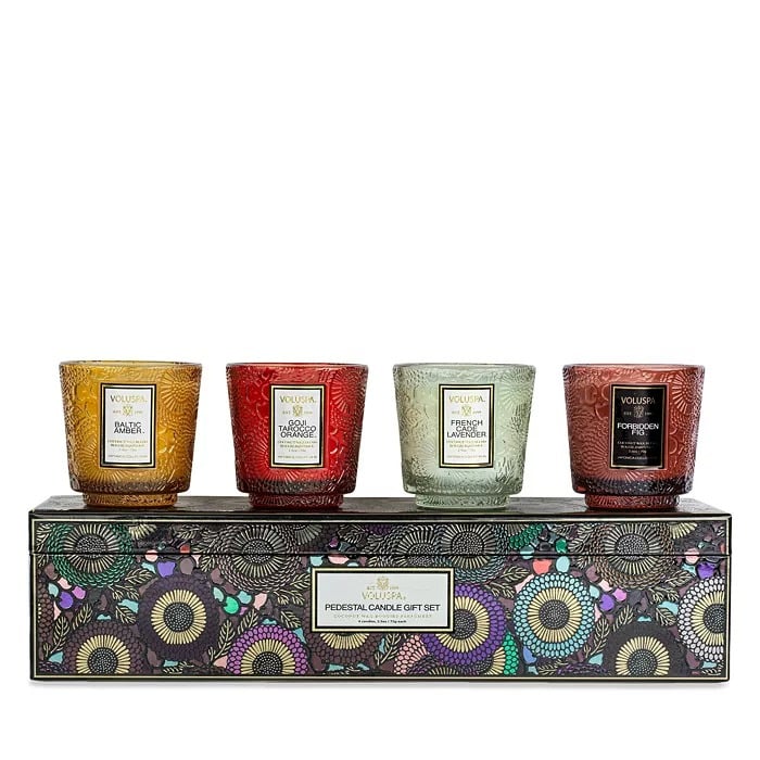 Voluspa Japonica Best-Sellers Petite Pedestal Candle Gift Box ($50)
This set of lovely little candles delivers on color and ambiance, whether you place one or the all four on a mantel or sideboard. With scents of Baltic Amber, Goji Tarocco Orange, French Cade Lavender, and Forbidden Fig, they'll bring the best of Voluspa to your giftee — all wrapped in a festive gift box.