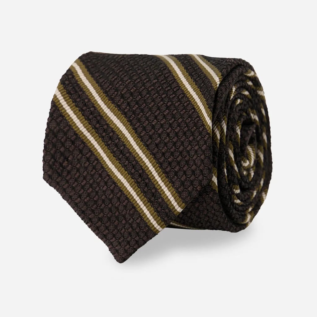 The Tie Bar Grenalux Stripe Chocolate Brown Tie ($20, originally $28)
The Tie Bar — which offers quality picks that are already budget-friendly to begin with — is offering 50 percent off some of its bestsellers, with additional styles being added continuously through the holiday. Whether you're shopping for yourself or for a loved one, there's no question the retailer offers one of the widest assortments on the internet. With 175+ designs marked down, it's time for you to stock up.