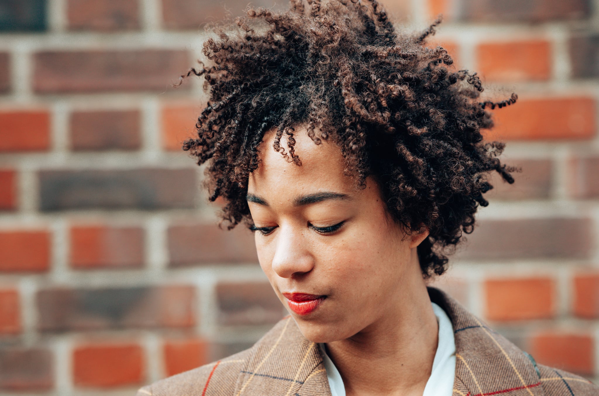 afro woman portrait on the streets