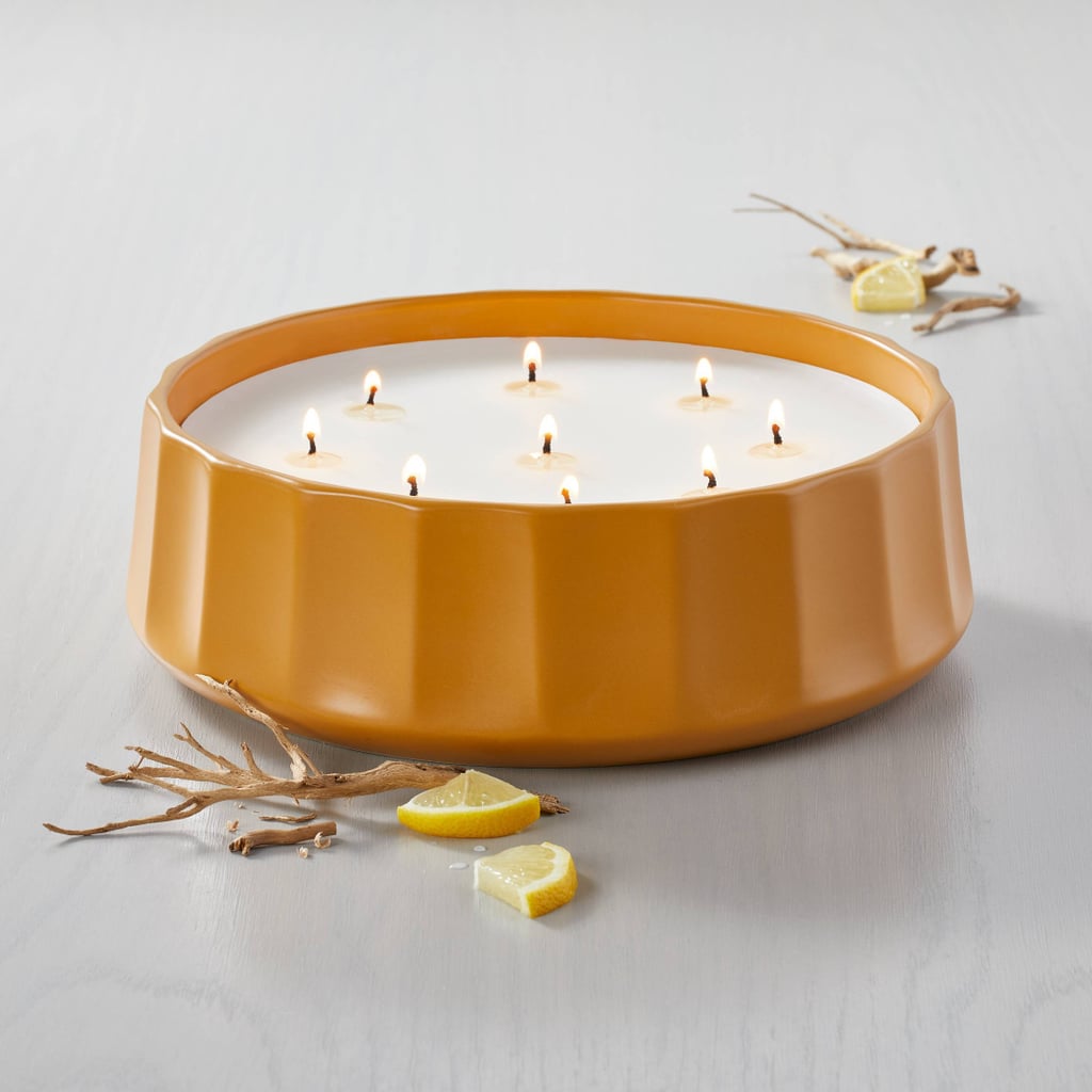 柑橘蜡烛:炉和手黄金小时槽陶瓷蜡烛