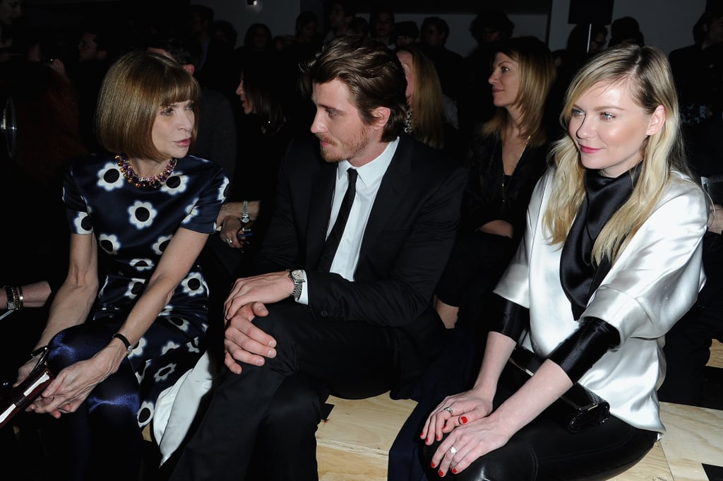 Anna Wintour took in the Saint Laurent Fall 2013 collection next to Kirsten Dunst and boyfriend Garrett Hedlund. Kirsten Dunst landed a cover of the September 2006 issue of Vogue, which coincided with the release of the film Marie Antoinette.