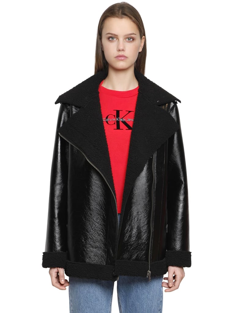 Do the all-black-everything thing in this Calvin Klein Jeans Ortensia Shiny Faux Shearling Coat ($333).
