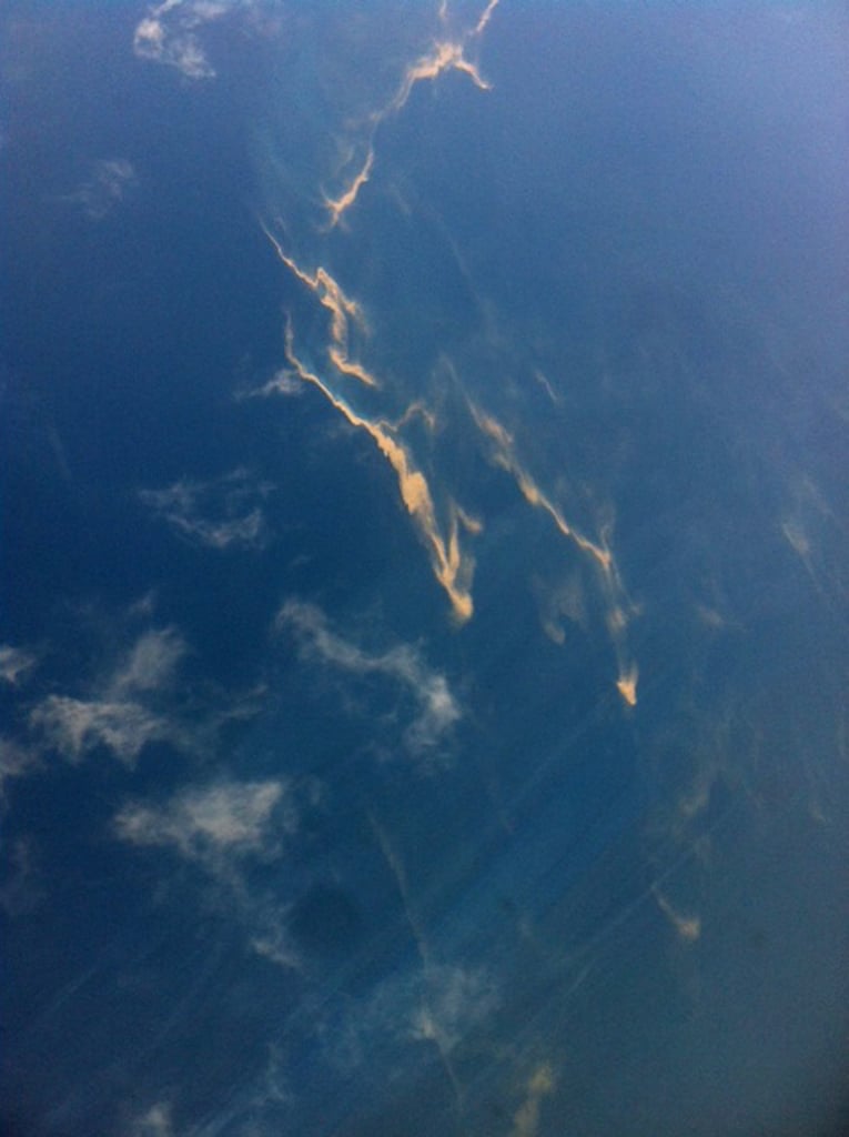 An aerial picture taken on Sunday shows oil spills in the sea.