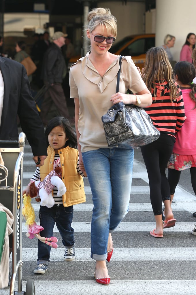 Katherine Heigl and her daughter Nancy held hands while arriving at LAX on Wednesday.