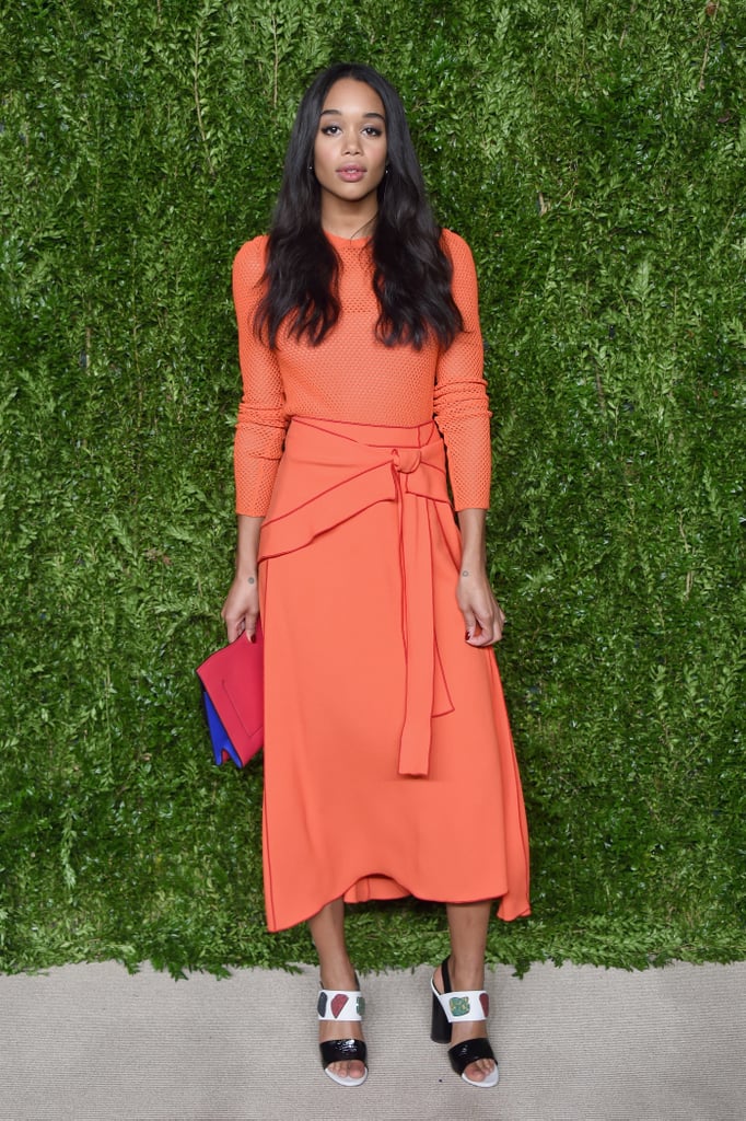 At the 13th Annual CFDA/Vogue Fashion Fund Awards wearing a belted orange Proenza Schouler dress.