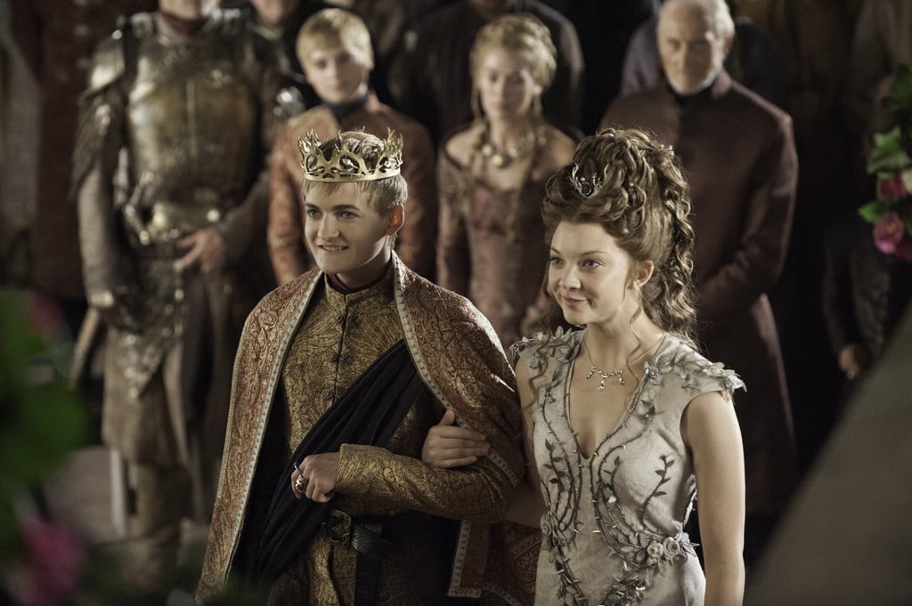 Bride Margaery and groom Joffrey stand at the altar.