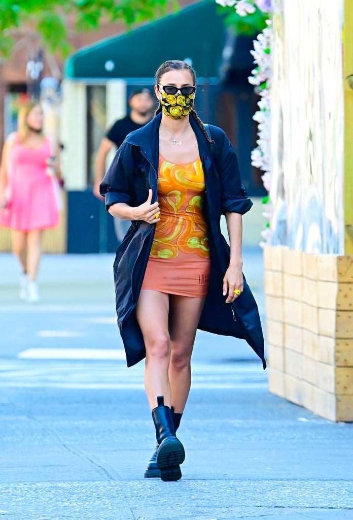 Irina Shayk Wearing an Orange Print Dress and Combat Boots in NYC