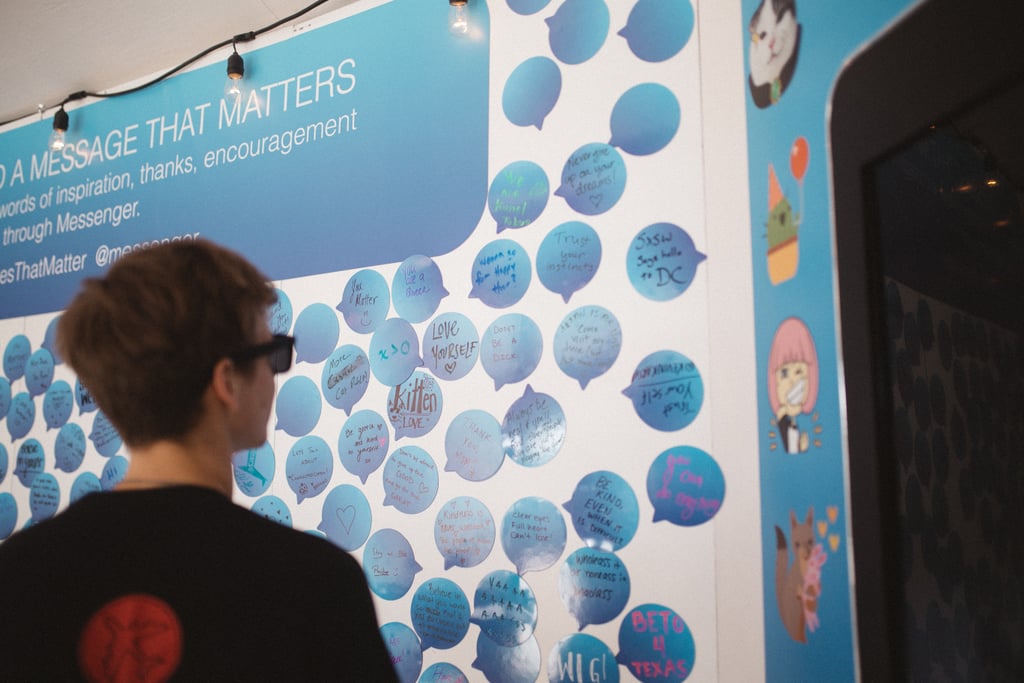 A man viewed his message on the wall.