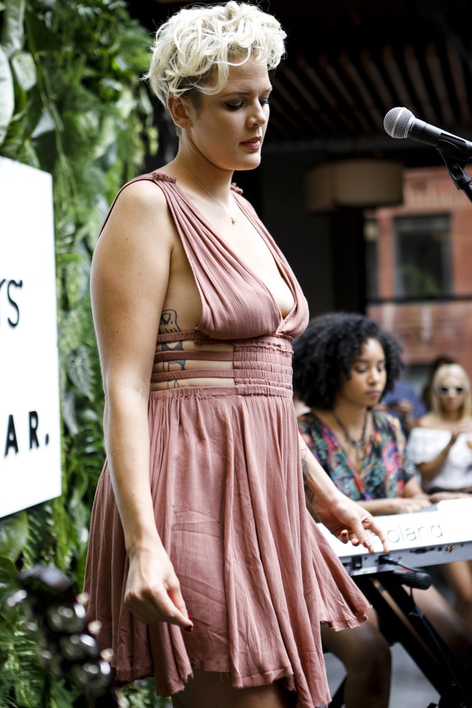 While performing at the POPSUGAR x Starbucks Refreshers party, Betty Who rocked a strappy, low-cut dress in dusty rose.