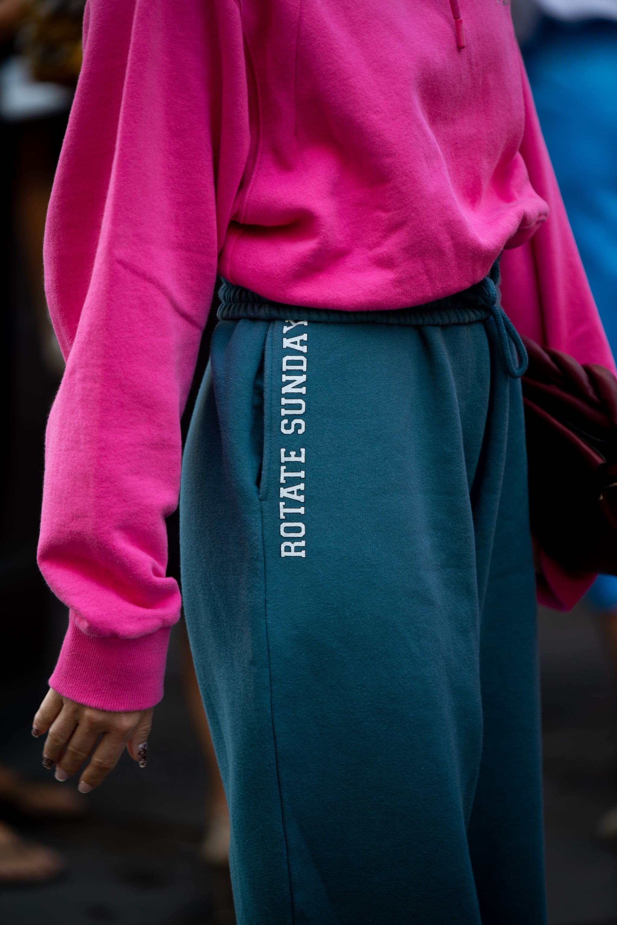 COPENHAGEN, DENMARK - AUGUST 11: Thora Valdimars wearing blue sweatpants, high-heels and pink jamper outside Lovechild 1979 wearing during Copenhagen fashion week SS21 on August 11, 2020 in Copenhagen, Denmark. (Photo by Raimonda Kulikauskiene/Getty Images)