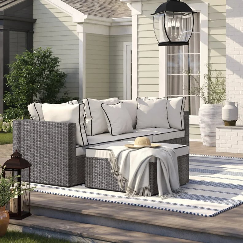 An Outdoor Sectional: Burruss Wide Outdoor Reversible Patio Sectional With Cushions