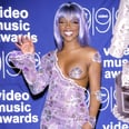 The Untold Fashion Story of Lil' Kim's Iconic Purple Pastie Jumpsuit From the 1999 MTV VMAs