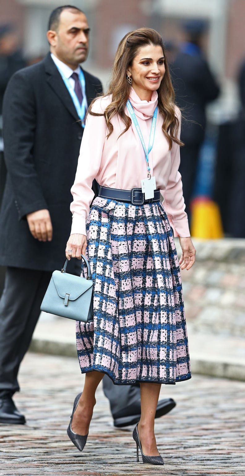 Queen Rania stuns in £4,000 coat and brand-new Louis Vuitton bag