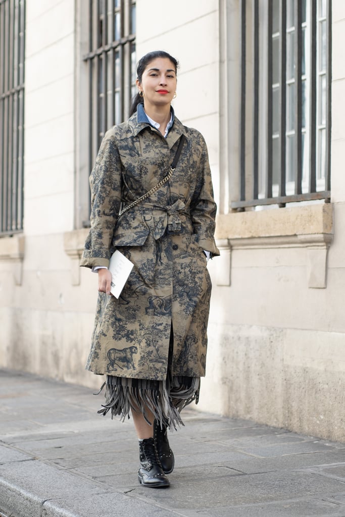 Work edgy, studded boots with a fringe skirt.