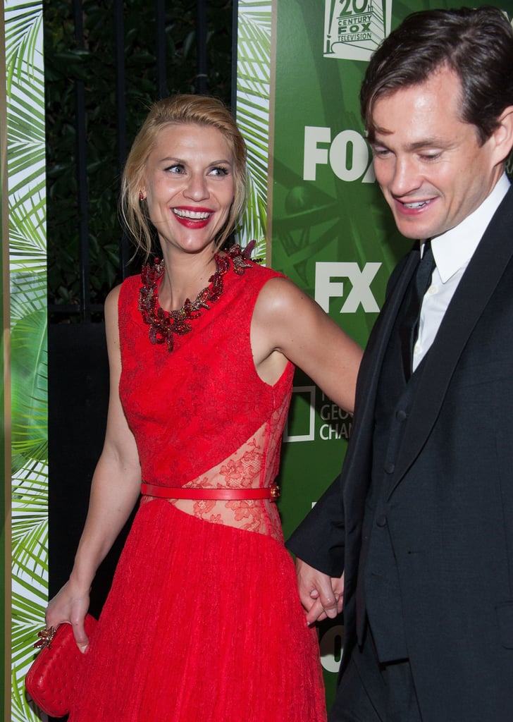 Claire Danes flashed a grin as she and husband Hugh Dancy hit up the Fox/FX bash.