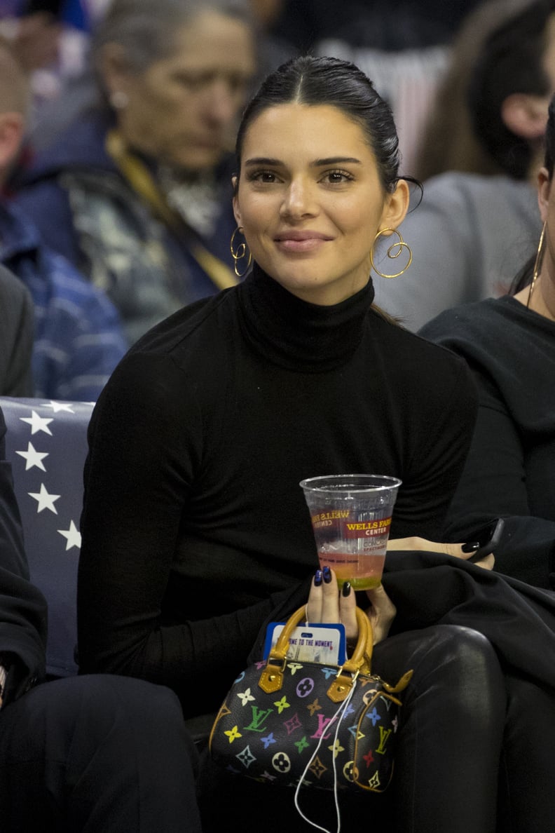 Kendall Wore the Rainbow Louis Vuitton Mini Bag to the Philadelphia 76ers Game