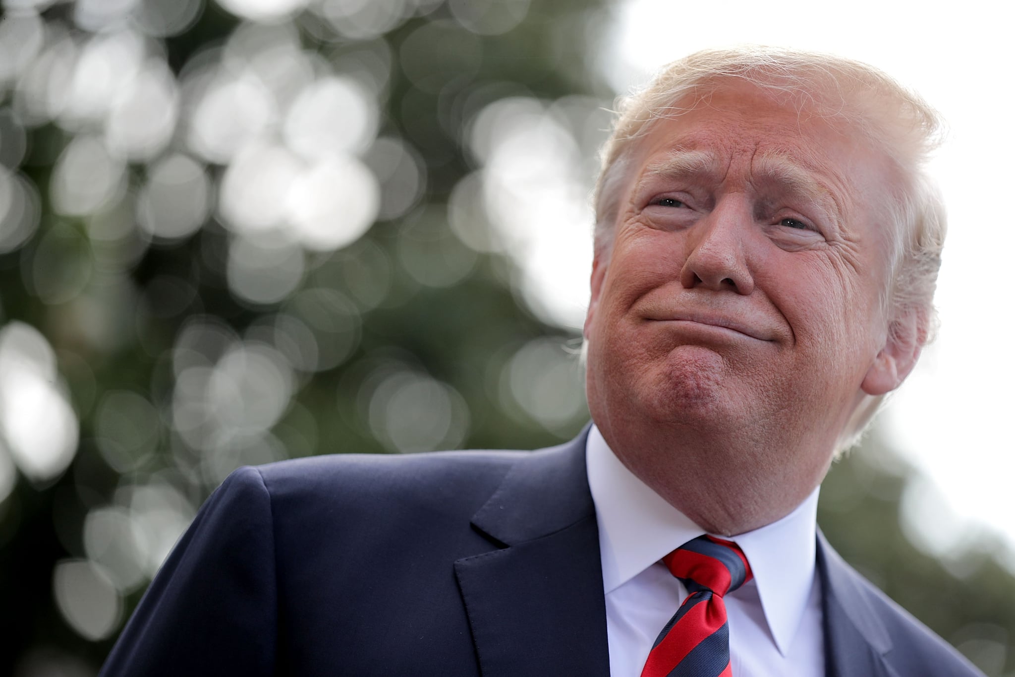 WASHINGTON, DC - JUNE 08:  U.S. President Donald Trump talks to reporters as he departs the White House June 8, 2018 in Washington, DC. Trump is travelling to Canada to attend the G7 summit before heading to Singapore on Saturday for a planned U.S.-North Korea summit.  (Photo by Chip Somodevilla/Getty Images)