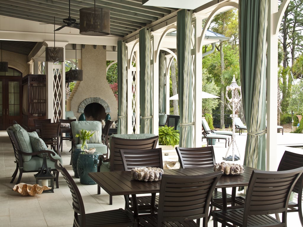 The home's outdoor space is designed for entertaining with over-the-top cooking amenities, including three grills, four refrigerators, a smoker, and a soda fountain.