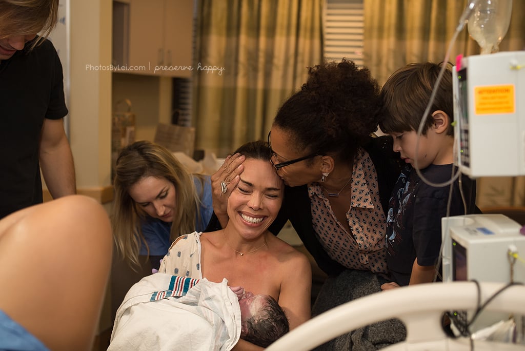 "My cousin, Ericka, congratulating me as Oliver's older brother looks on."