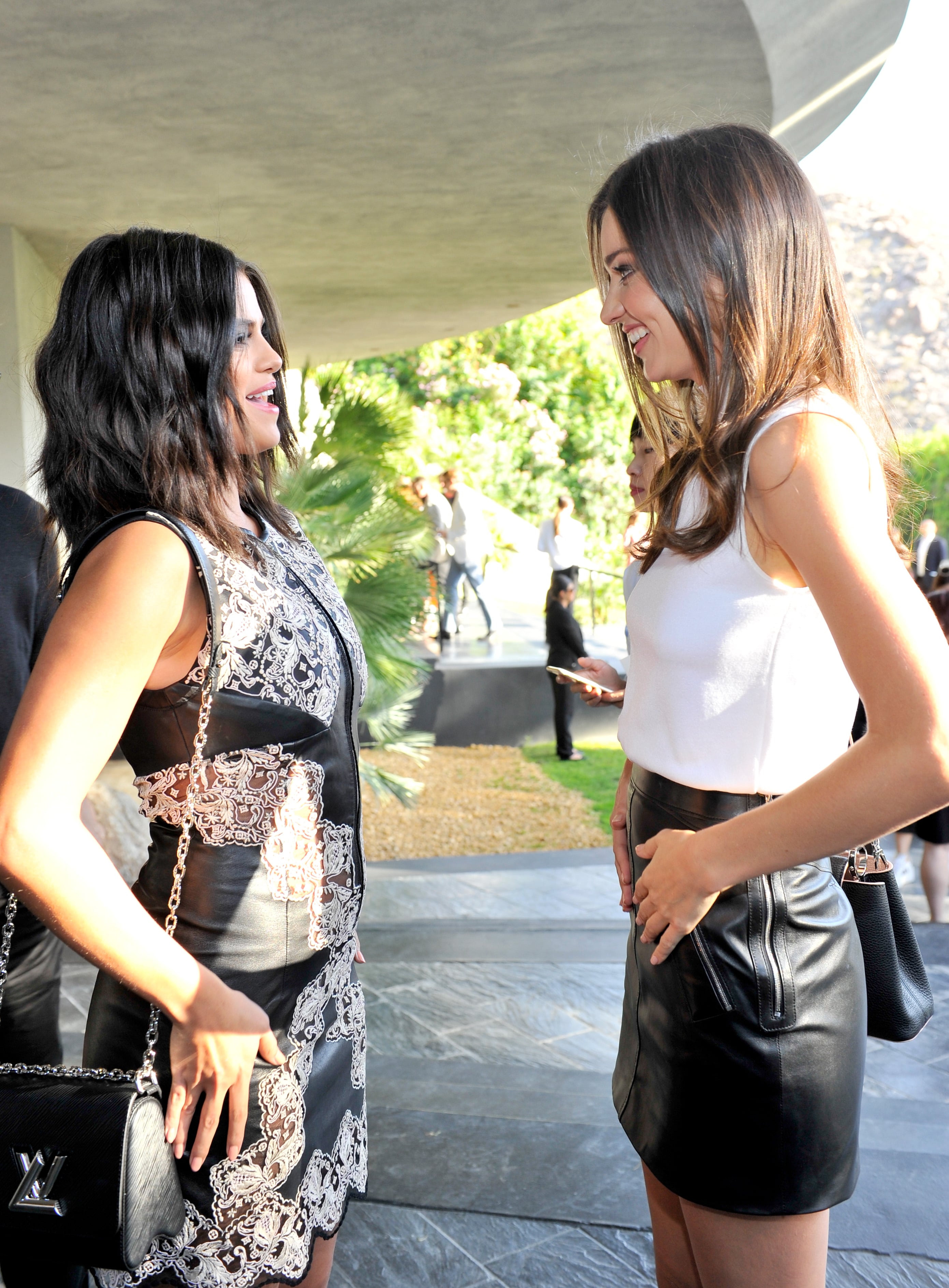 Selena attending Louis Vuitton Cruise 2016 Resort Collection candids plus  pics from inside
