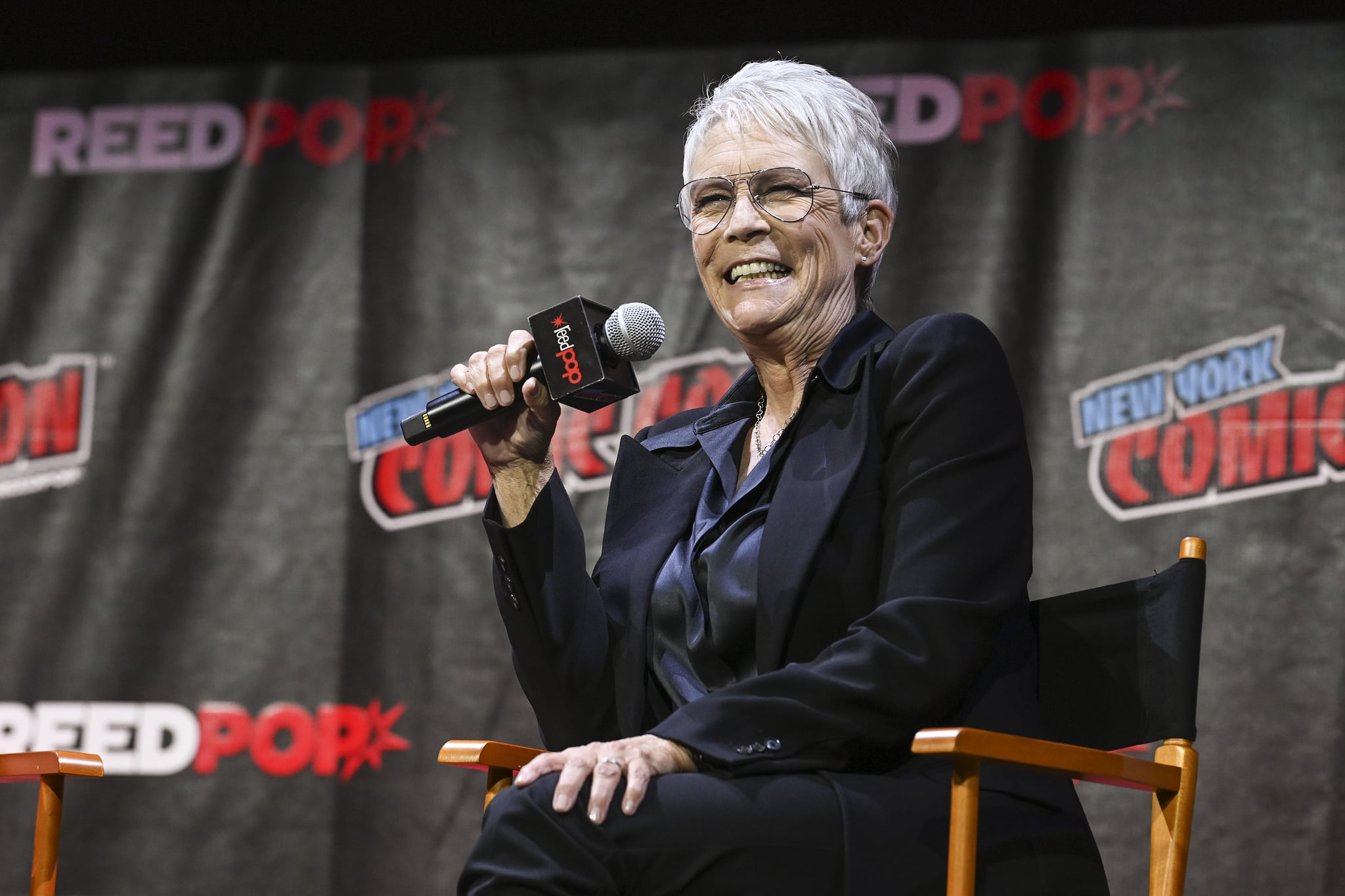 NEW YORK, NEW YORK - OCTOBER 08:  Jamie Lee Curtis speaks onstage during HALLOWEEN ENDS presented by Universal Pictures during New York Comic Con at Jacob Javits Centre on October 08, 2022 in New York City. (Photo by Slaven Vlasic/Getty Images for Universal Pictures)