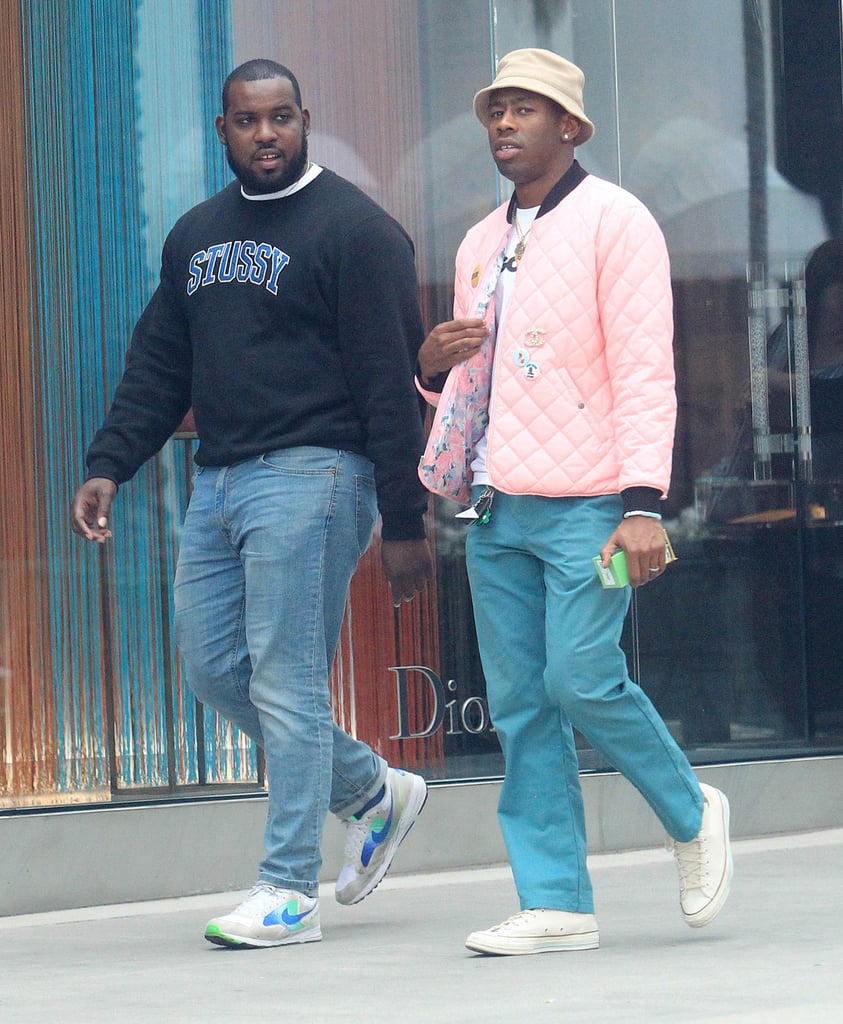 While in Los Angeles, Tyler styled a pink quilted jacket with a classic bucket hat and teal pants like an absolute pro.
