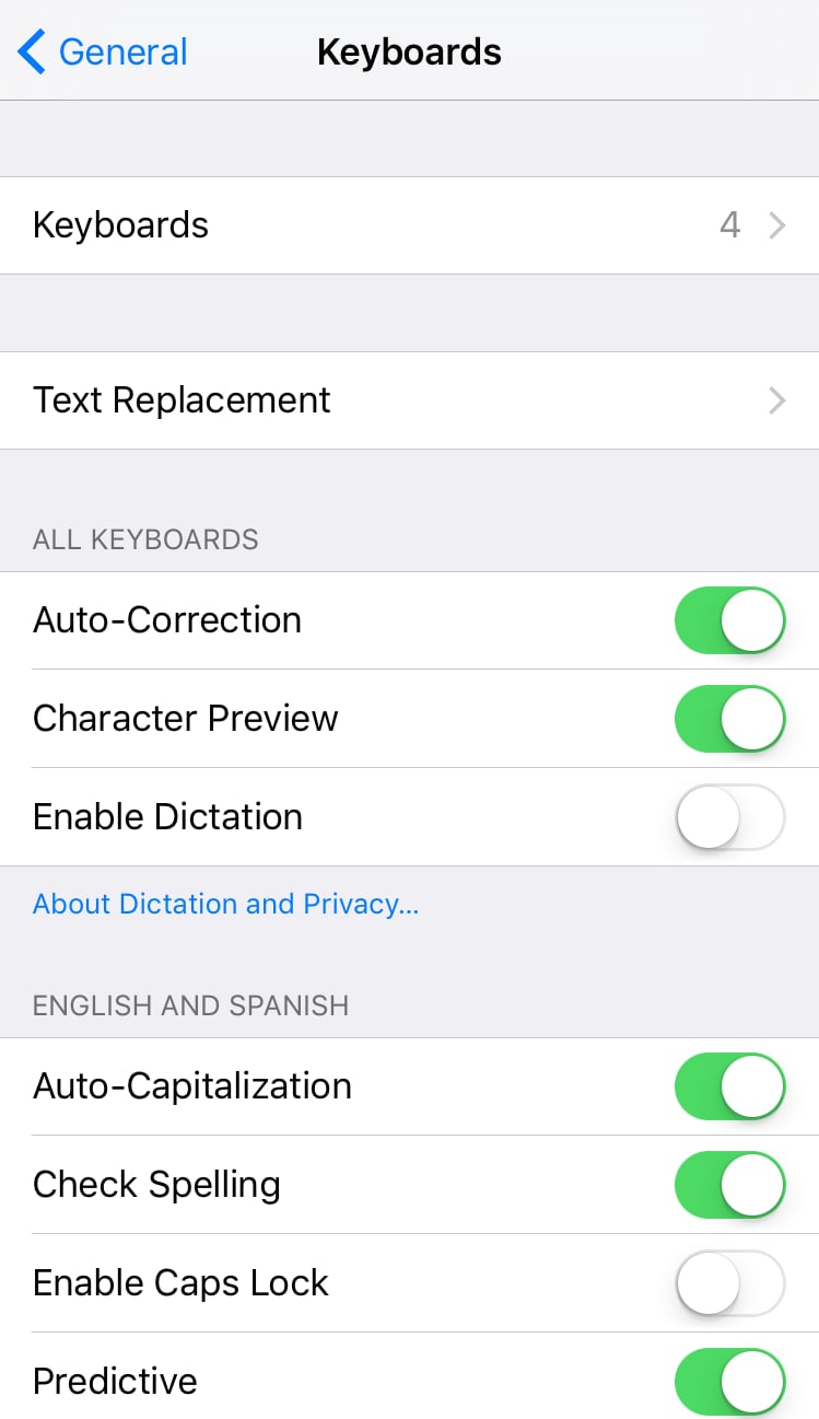 Once you're in the keyboard settings, select Text Replacement.