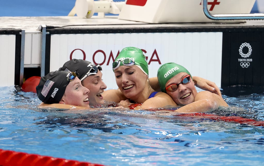 Swimmers Share Four-Way Hug After 200-Meter Breast Stroke Final