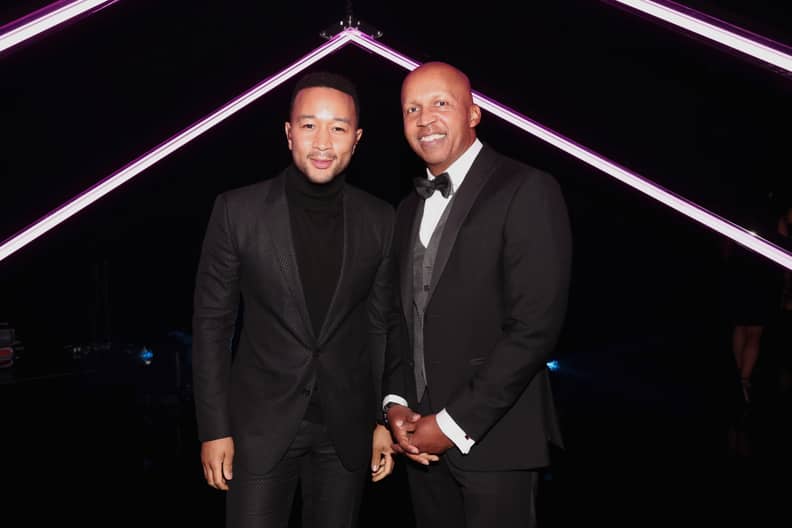 SANTA MONICA, CA - NOVEMBER 11:  2018 E! PEOPLE'S CHOICE AWARDS -- Pictured: (l-r) Recording artist John Legend and People's Champion Award honoree Bryan Stevenson pose during the 2018 E! People's Choice Awards held at the Barker Hangar on November 11, 20