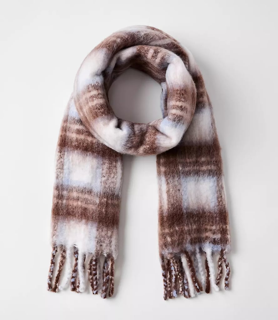 LOFT Plaid Blanket Scarf ($25, originally $50)
This plaid blanket scarf is the definition of cozy-chic. It's oversized, soft, and instantly pulls together any winter outfit. Whether you gift it to yourself, wrap it up for someone you love, or stock up now and decide later, you truly can't go wrong.