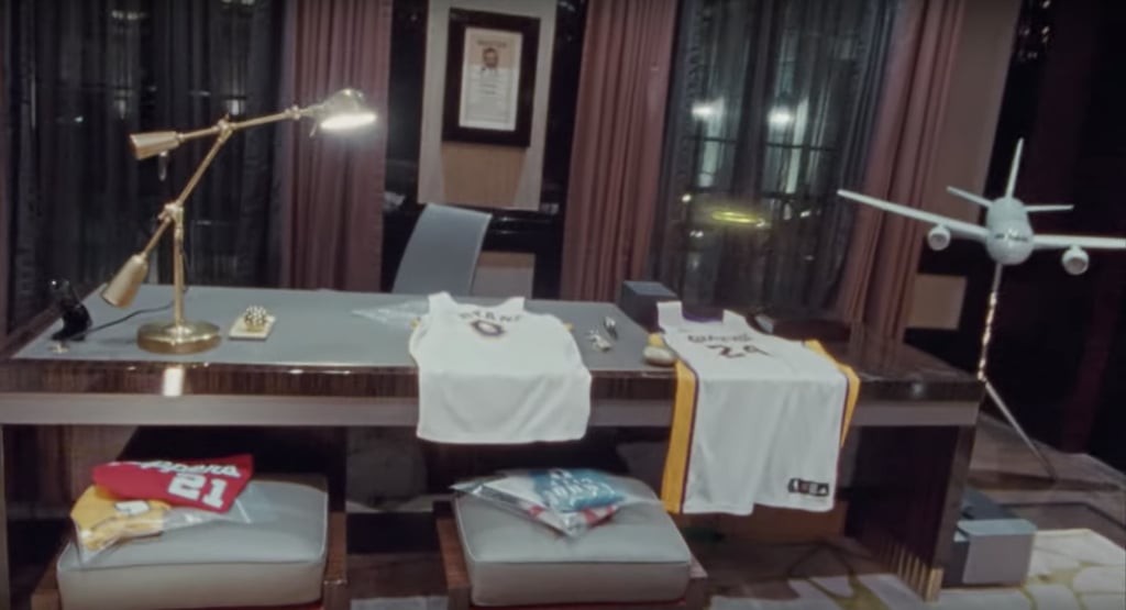 He Has Kobe Bryant Jerseys on This Table — and an Airplane Statue in the Corner