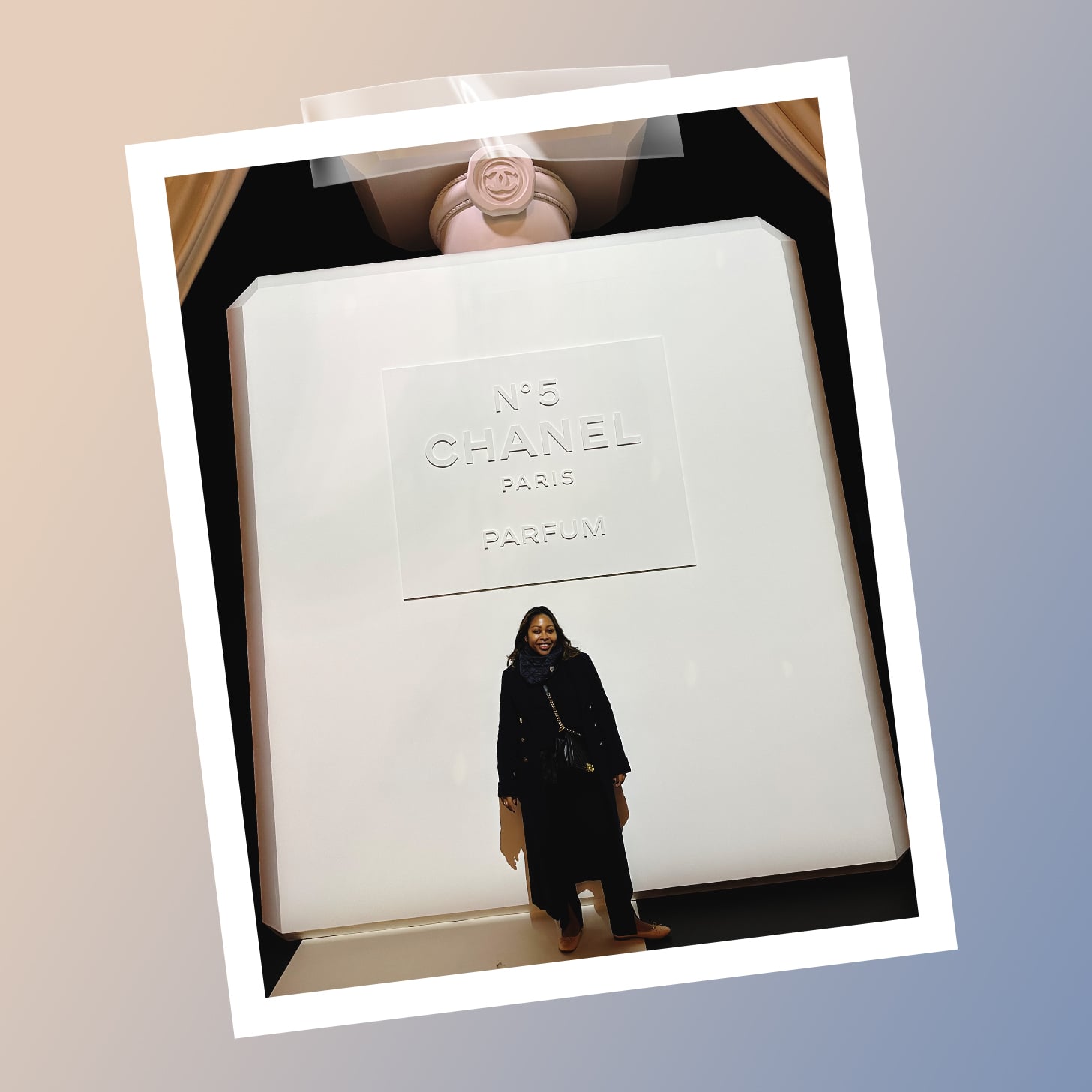Sade Strehkle in front of Chanel No. 5 display in Paris.