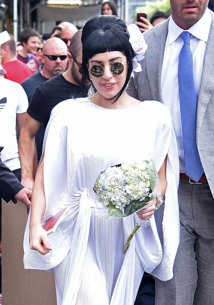 Lady Gaga stepped out in wedding white in NYC on Friday.