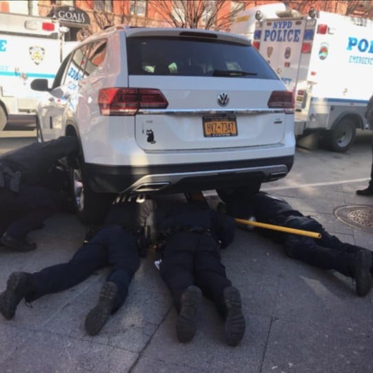 Police Officers Save Trapped Kitten