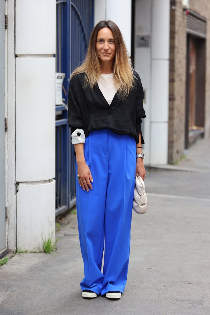 Cobalt trousers make a splashy contrast to white and black.