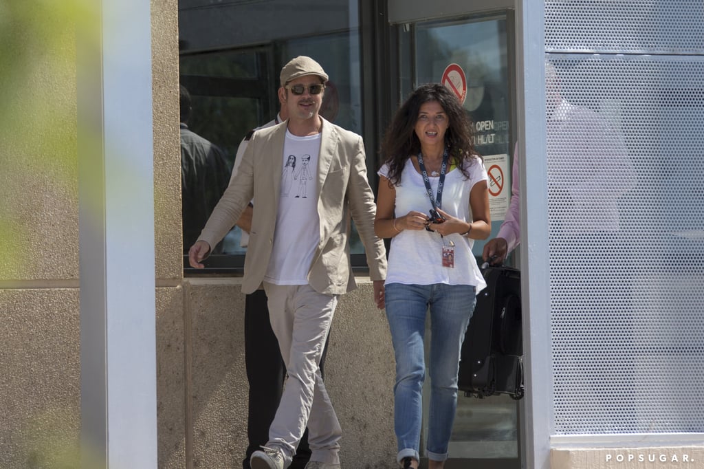 Brad Pitt Wears Homemade Shirt at Airport in France | Photos