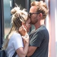 Aaron Paul Showers His Wife With Kisses During Their NYC Outing