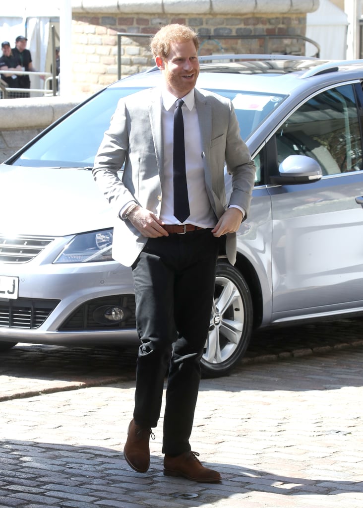 When he attended a reception with delegates from the Commonwealth Youth Forum, Harry wore a gray blazer, a white shirt, a black tie, black pants, and brown accessories.