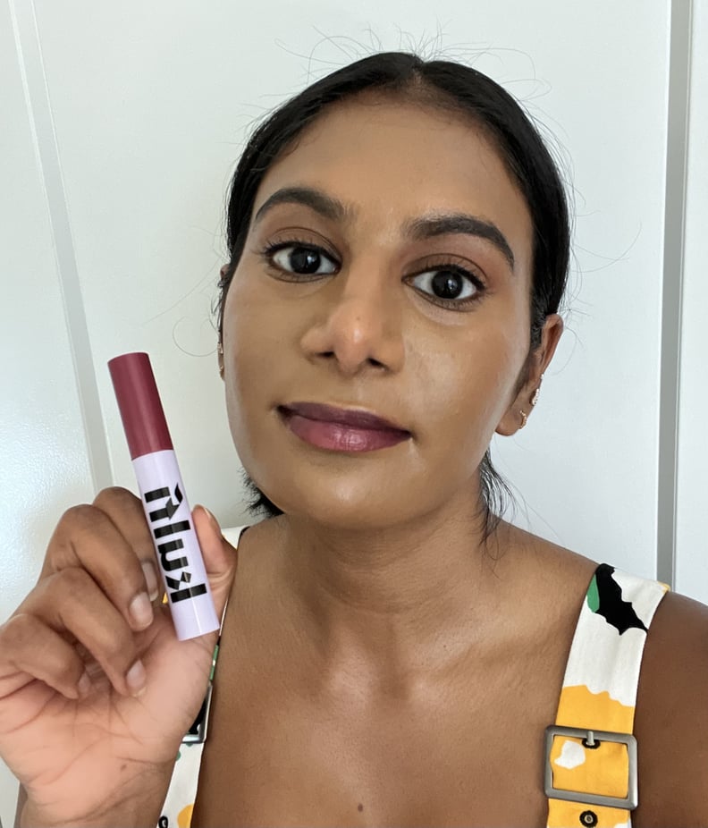 Woman wearing the Kulfi Beauty Lassi Lips Staining Lip Oil in First Sari.