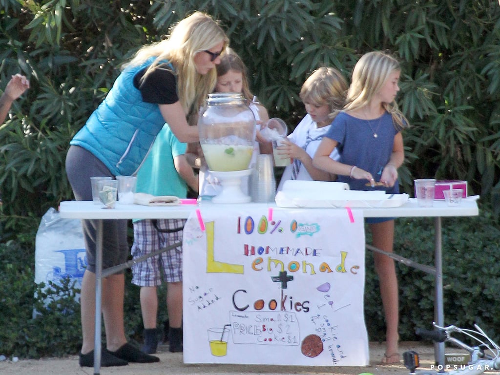 Gwyneth Paltrow helped her kids, Apple and Moses Martin, sell cookies and lemonade on a street corner in LA's Pacific Palisades neighborhood.