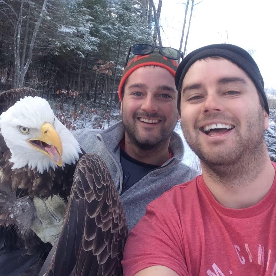 In what may be the most American photo ever, brothers Michael and Neil Fletcher scored this selfie after helping the eagle out.
