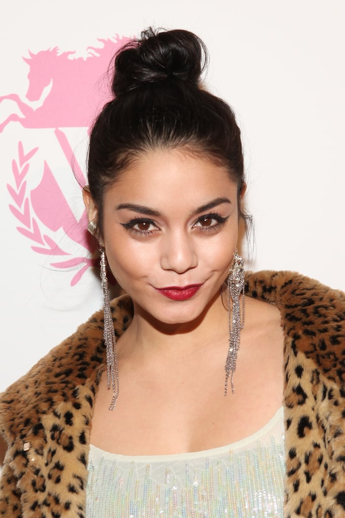 To dress up a topknot like Vanessa Hudgens, just add red lipstick and cat eyeliner.